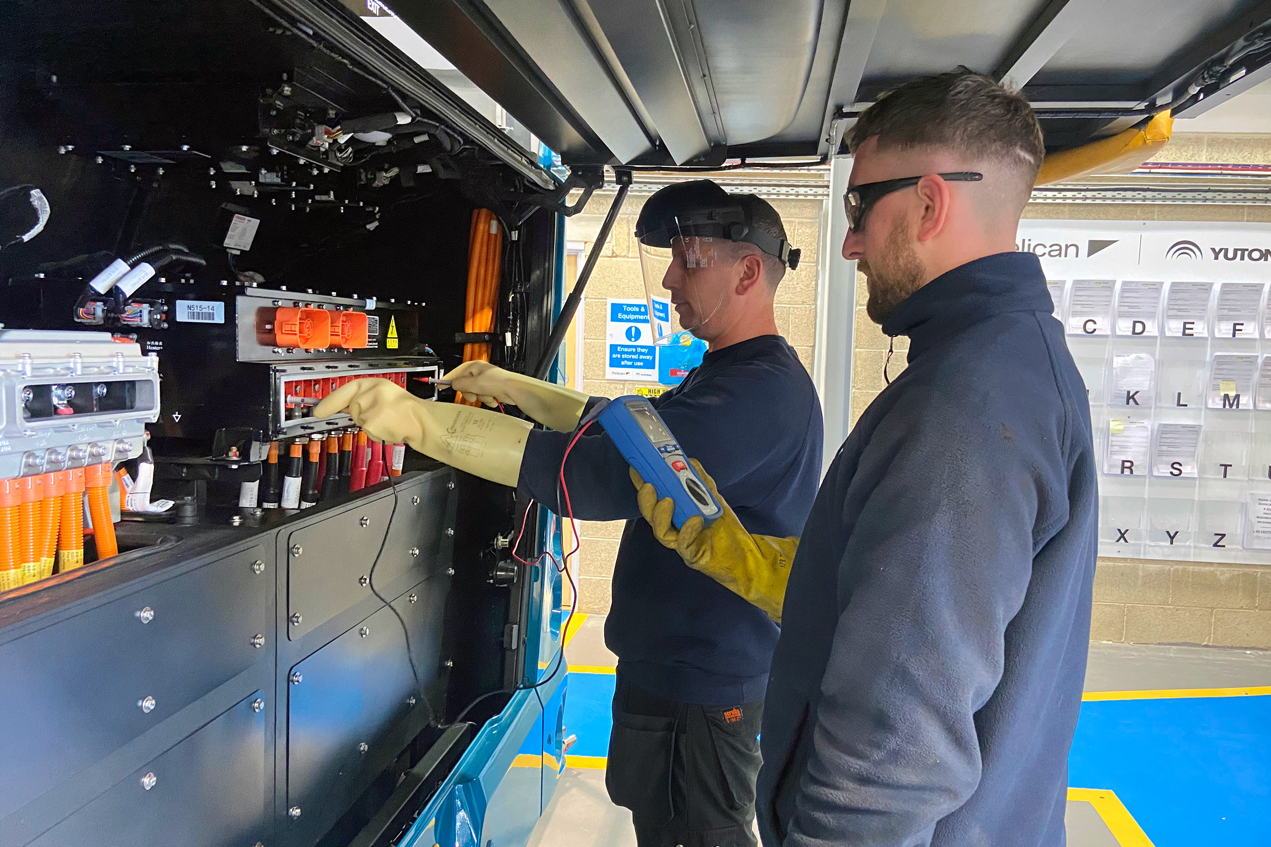Product Training engineers on a Yutong electric bus